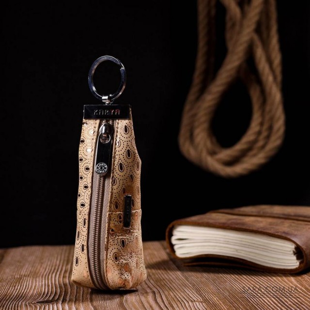 Незвичайна містка ключниця KARYA 20933 шкіряна Золотистий Незвичайна містка ключниця KARYA 20933 шкіряна Золотистий